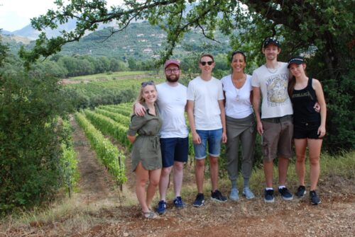 A group of people in the vineyards